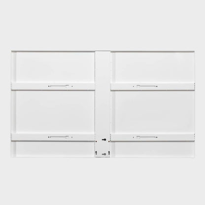 Backside of a heavy-duty white steel basketball backboard detailing the reinforced metal frame, mounting slots, and rim attachment points.