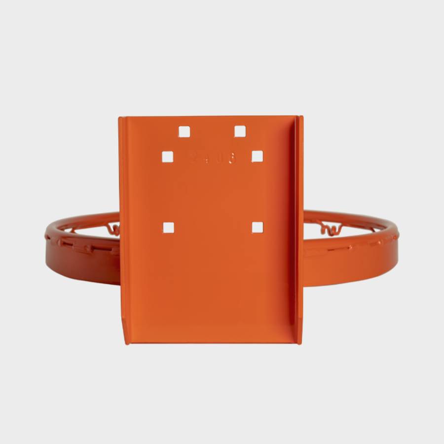 Direct rear view of a playground breakaway basketball rim mounting bracket, highlighting the flat orange backplate and pre-drilled square bolt hole pattern.