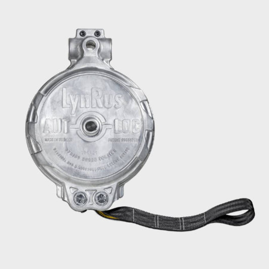 Close-up of the MA11482 Safestop backboard fall arrest device, highlighting the die-cast housing, mounting brackets, and heavy-duty retractable safety belt.