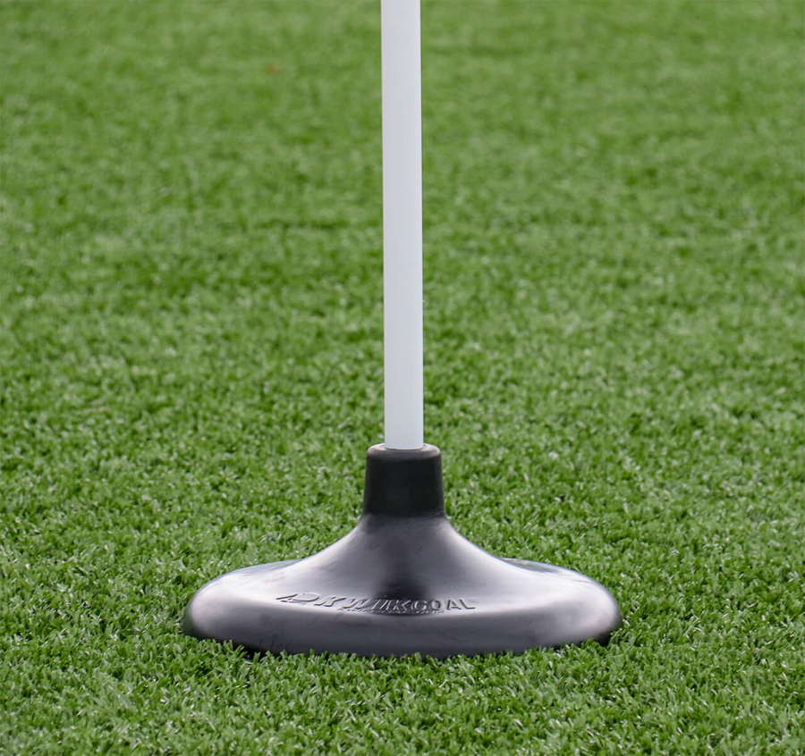 Kwik Goal 2B1404 Premier Turf Corner Flags | Set of 4 - Close-up of the 12-inch high-density stackable rubber base on Kwik Goal artificial turf soccer flags.