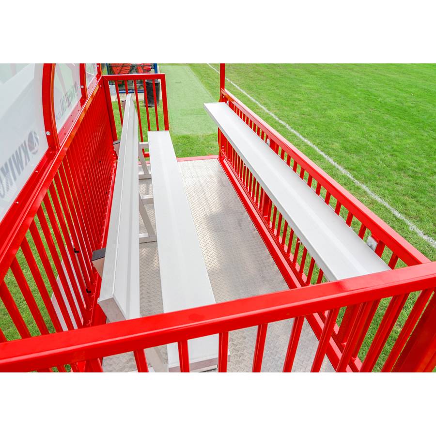 View of the seating inside the Kwik Goal 9B6501 portable scorer's tower featuring a custom colored aluminum and steel frame with a UV-resistant polycarbonate roof.