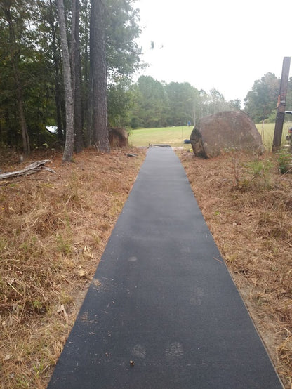 Rollout runway set up in a javelin training facility outdoors.